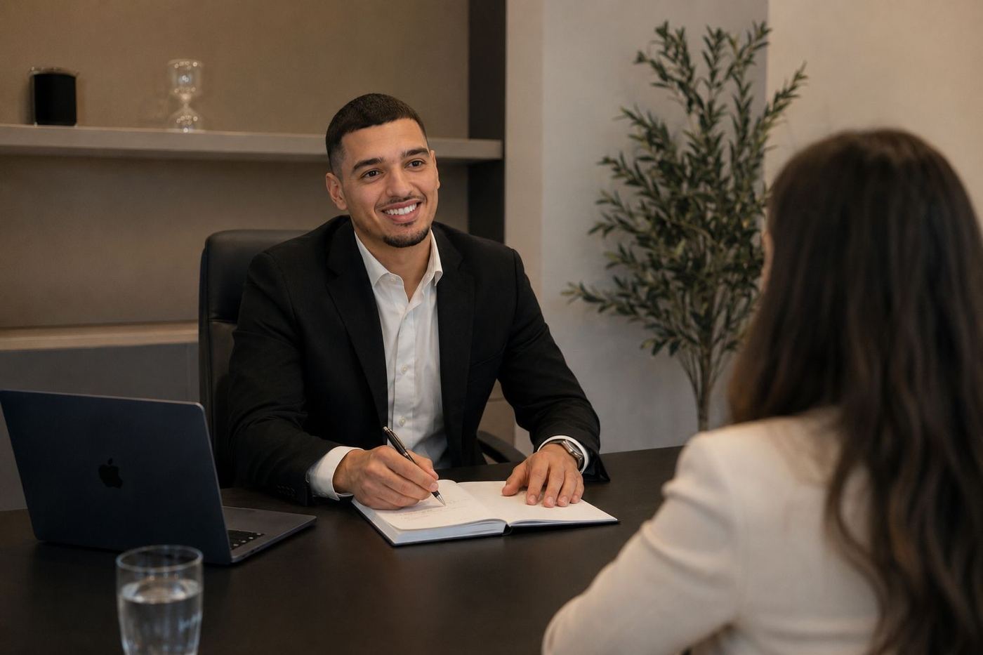 Kleanthis Sokratous advising a client at his office